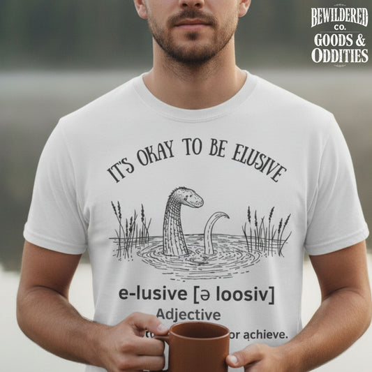 It's Okay to Be Elusive T-Shirt — Nessie Illustration & Definition Tee
