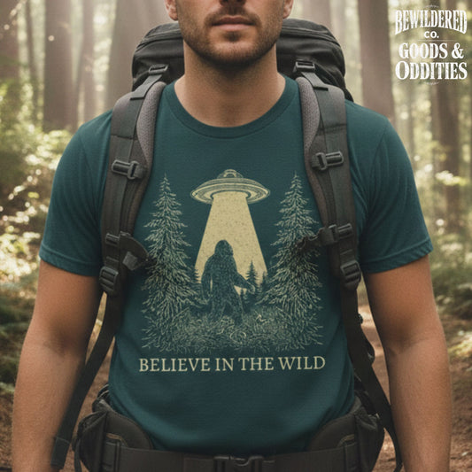 T-Shirt — 'Believe in the Wild' UFO Bigfoot Forest Graphic Tee