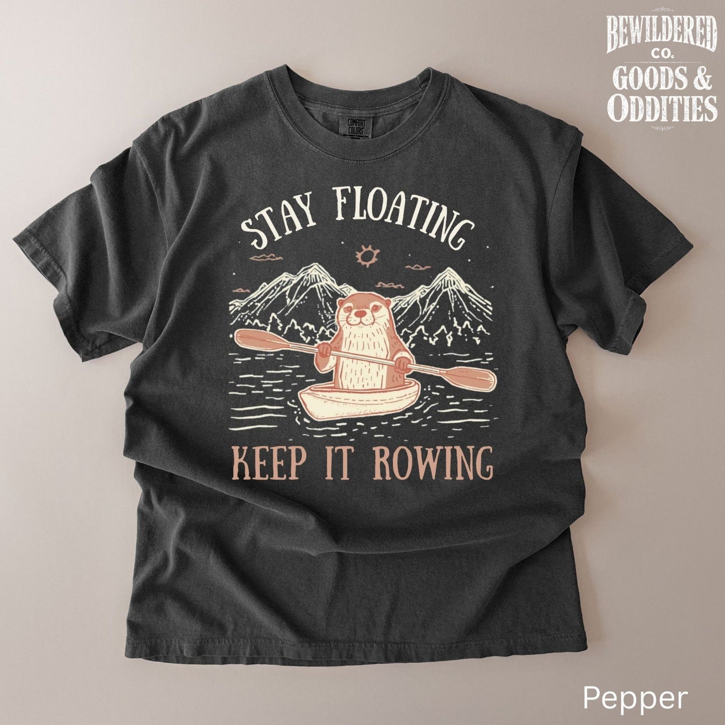 River Queen T-Shirt — Cute Otter Canoe Graphic Tee for Outdoor Lovers